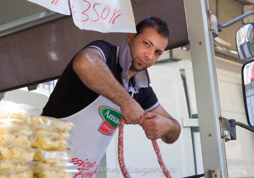 Sausage Seller in Sicily, copyright Jann Huizenga