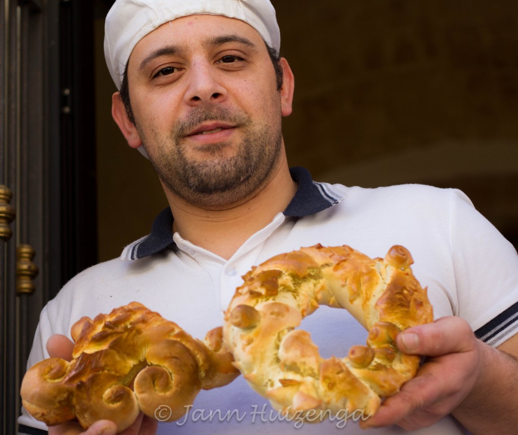 Sicilian Baker with St Joseph's Day Breads, copyright Jann Huizenga