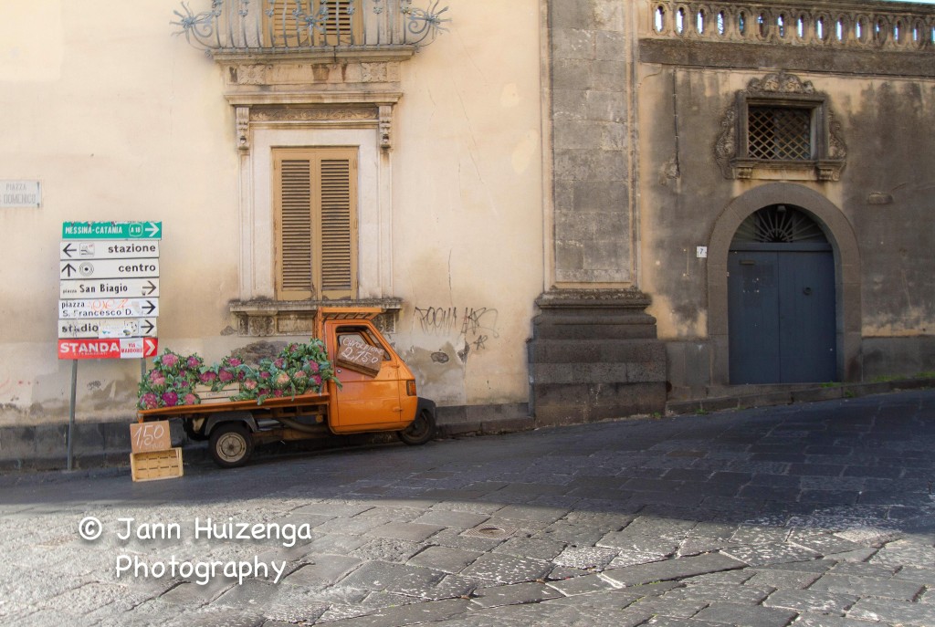 Little Orange Truck in Acireale, Sicily, copyright Jann Huizenga